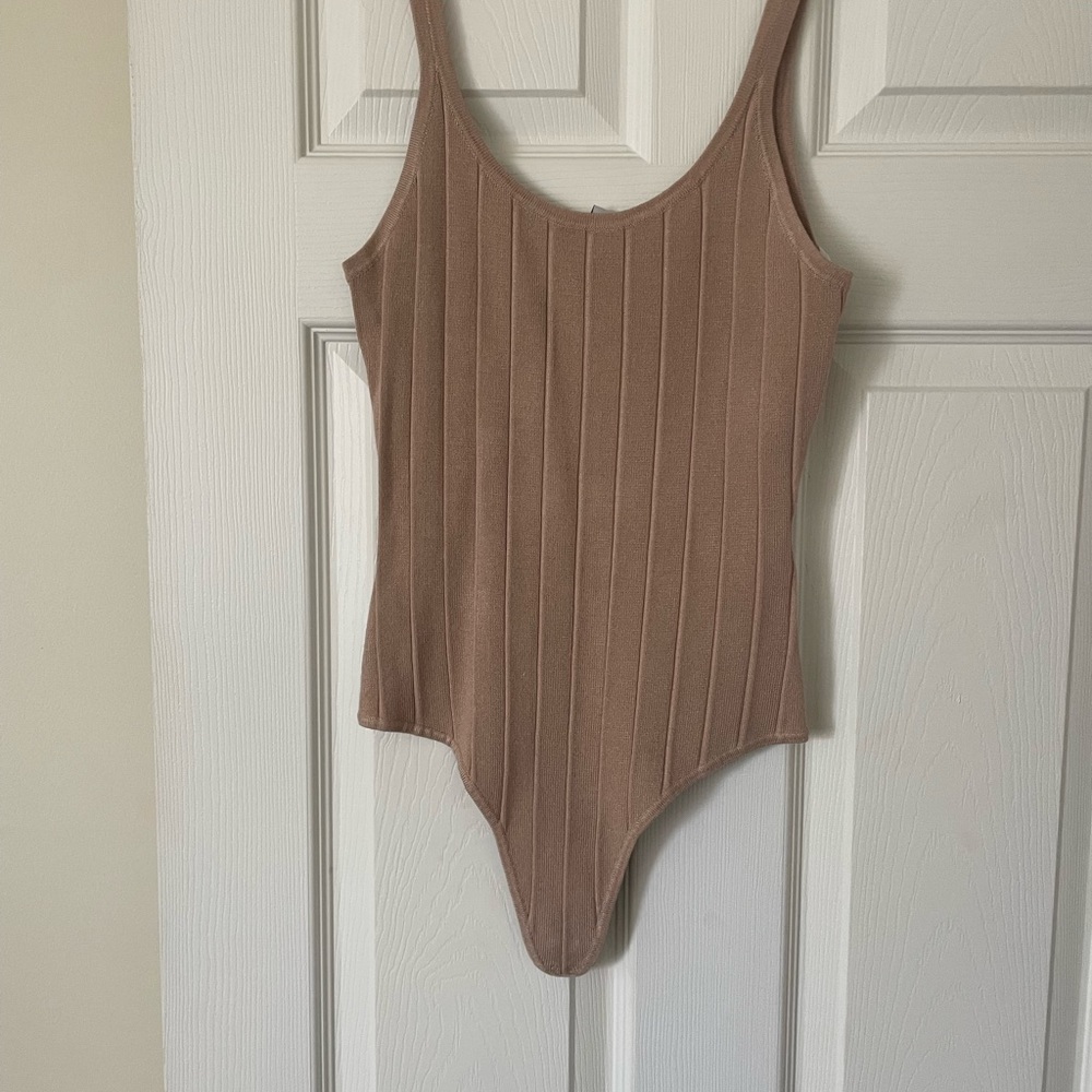 Brand new GBG Jupiter high cut body suit